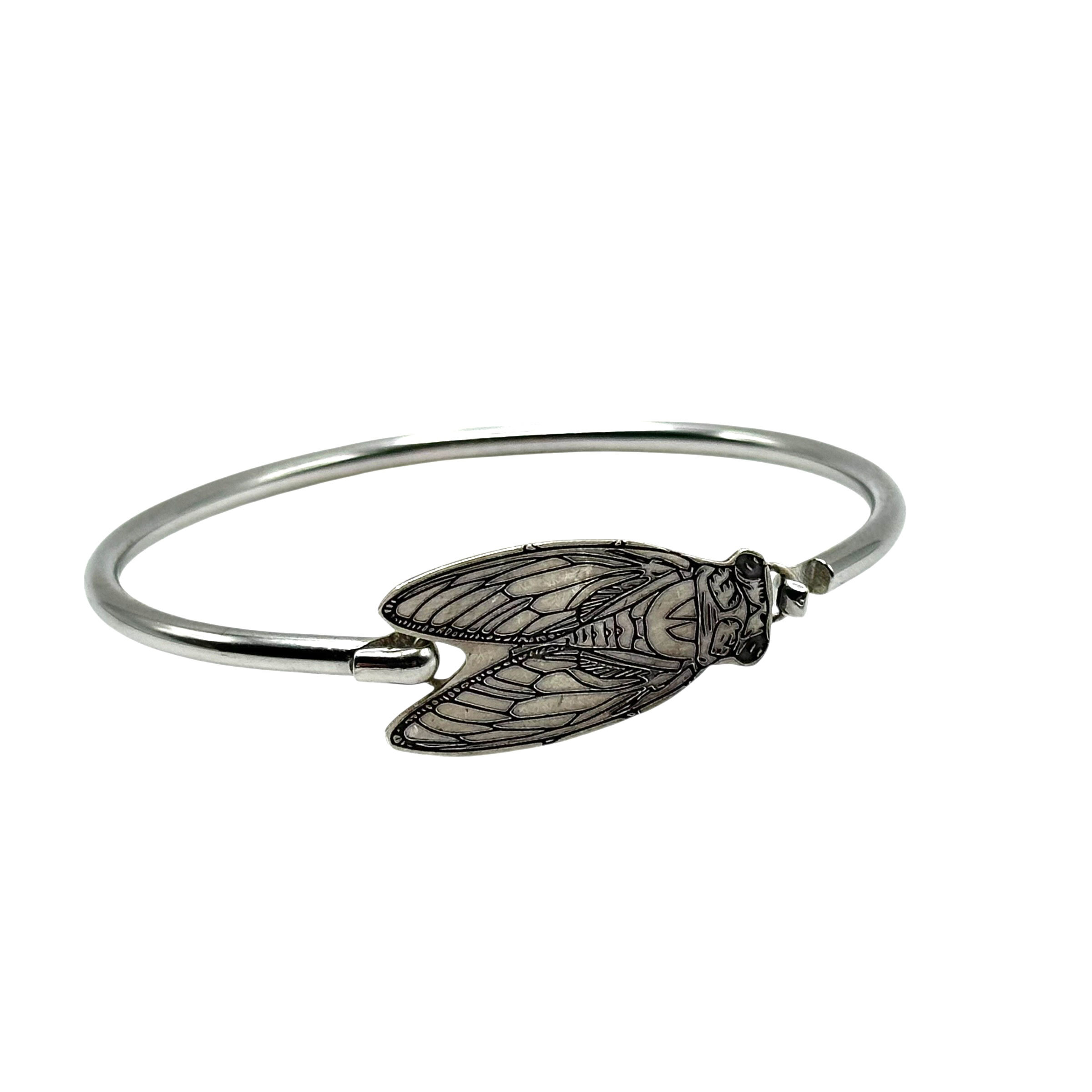 Sterling Hook tension bracelet.