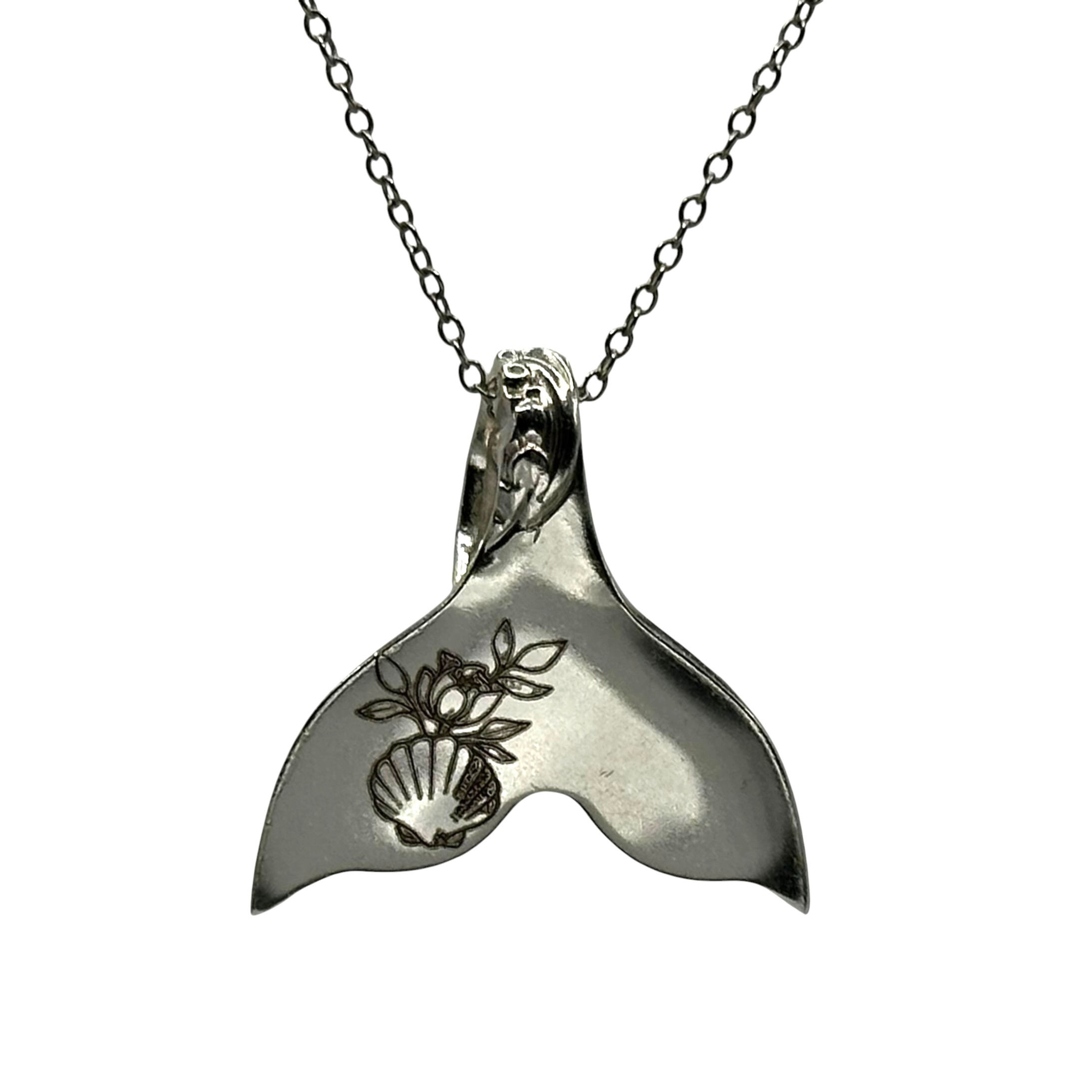Mermaid tail necklace.
