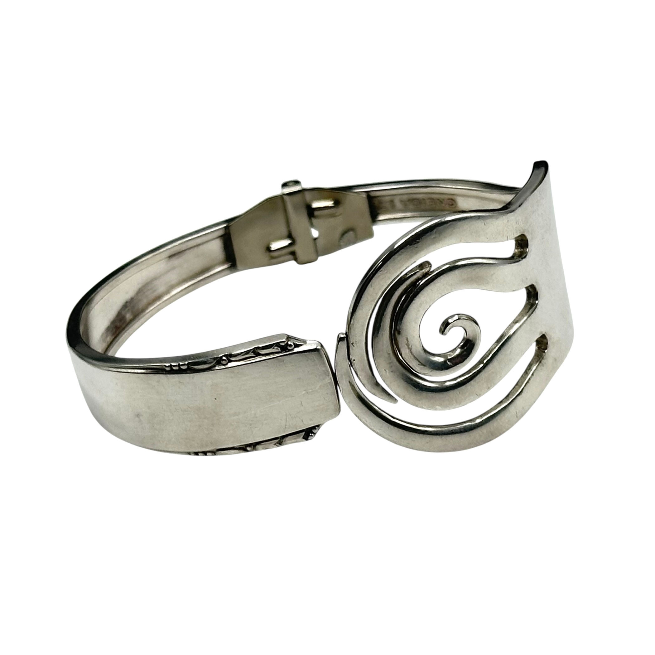 Hinged fork bracelet. 