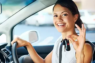 female driver with car keys