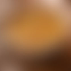 Warm homemade soup served in a ceramic bowl, ready to eat.