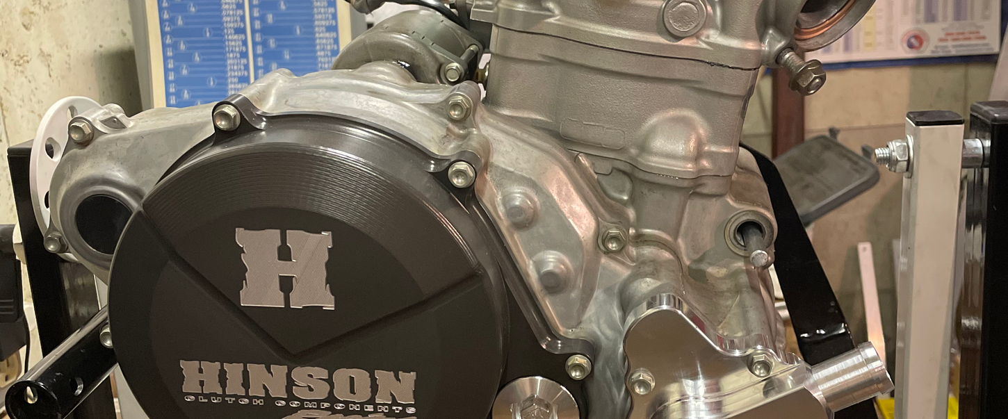 Motorcycle engine with Hinson clutch cover on stand