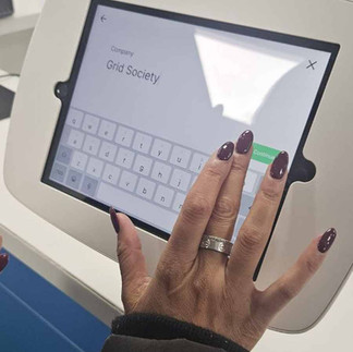 Grid Society workshop delivery at Guildford College showing structured thinking tools used during a live session