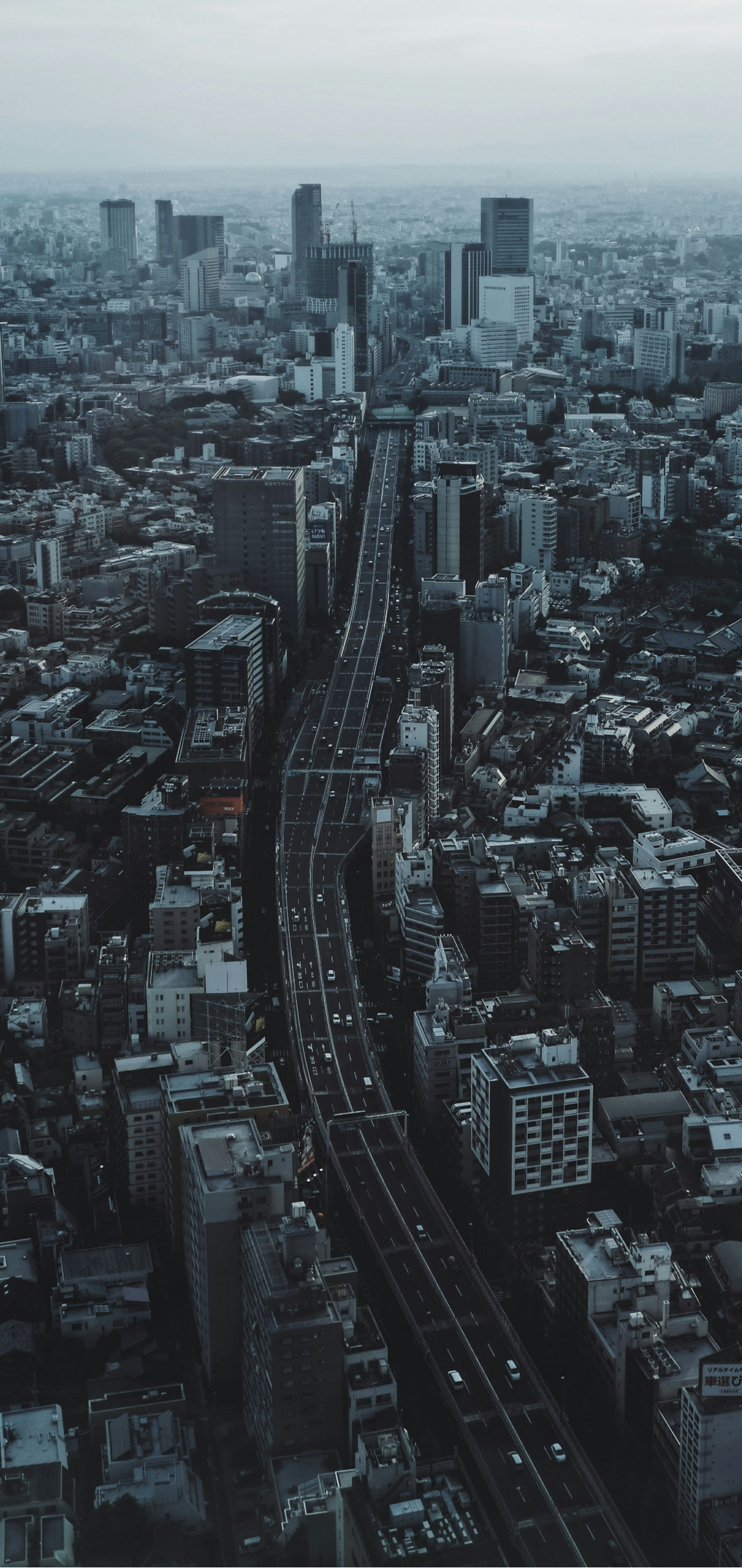 Aerial city view representing the comparison spiral and how comparing yourself to friends can make your own progress feel inadequate.