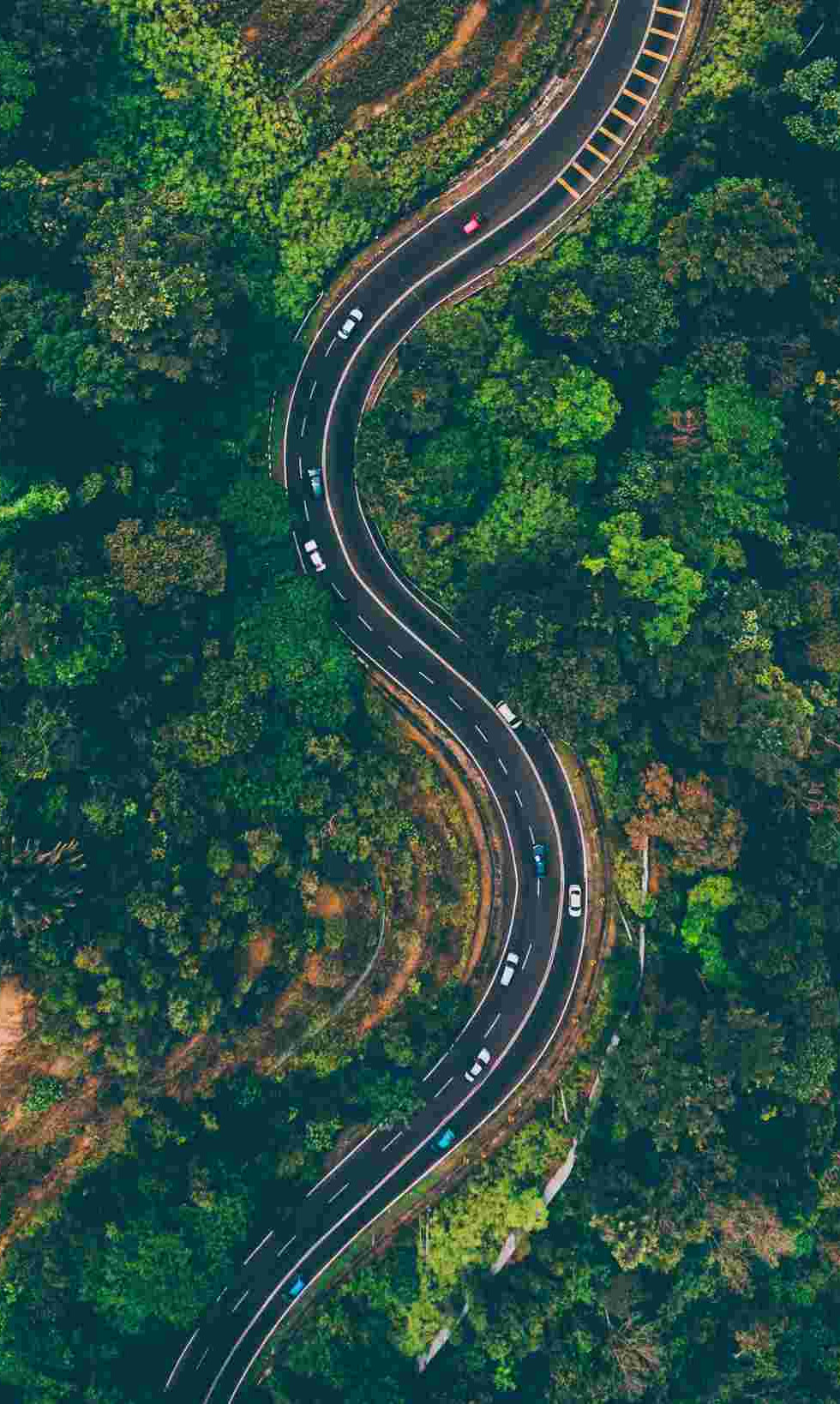Winding road representing questioning the story your mind is telling you before believing the feeling.