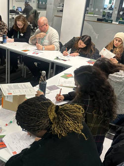Level 2 counselling students completing written exercises during Confront the Grey Voices workshop at Barking and Dagenham College