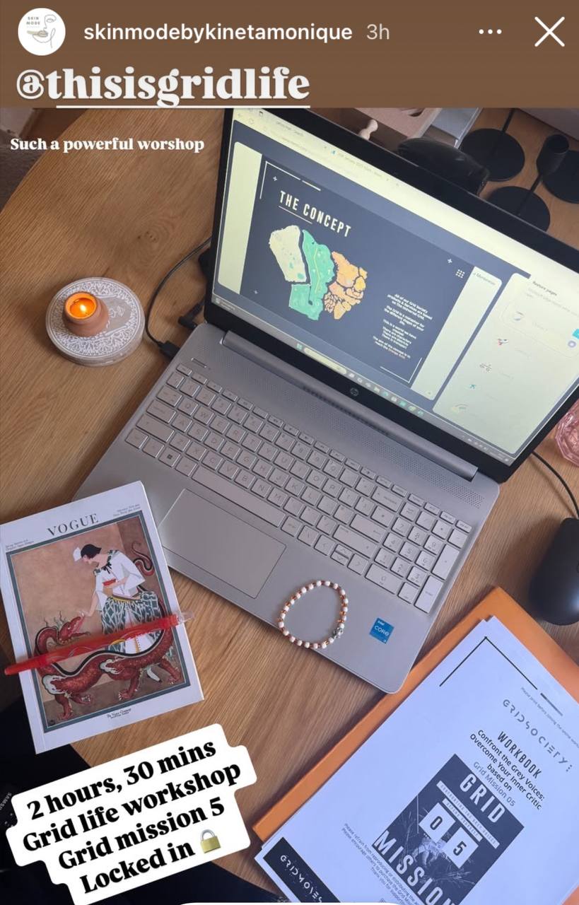 “Grey Voices Workshop attendee’s Orange Space setup showing laptop with Grid Society presentation, Vogue book, candle, bracelet, and Grid Society workbook used during the session.”