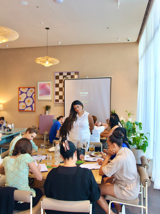 Grid Society workshop in Dubai participants using structured thinking tools and workbooks