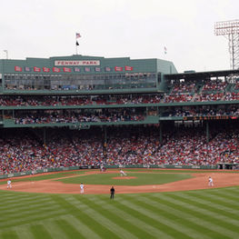 Fenway Park stadium during a baseball game with fans and players forthillinn