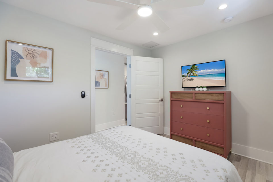 Queen bedroom with smart TV