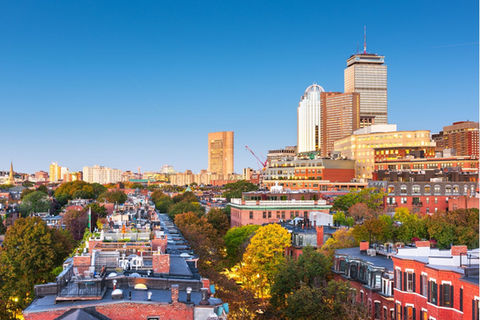 Boston skyline with numerous buildings and colorful autumn trees, forthillinn.
