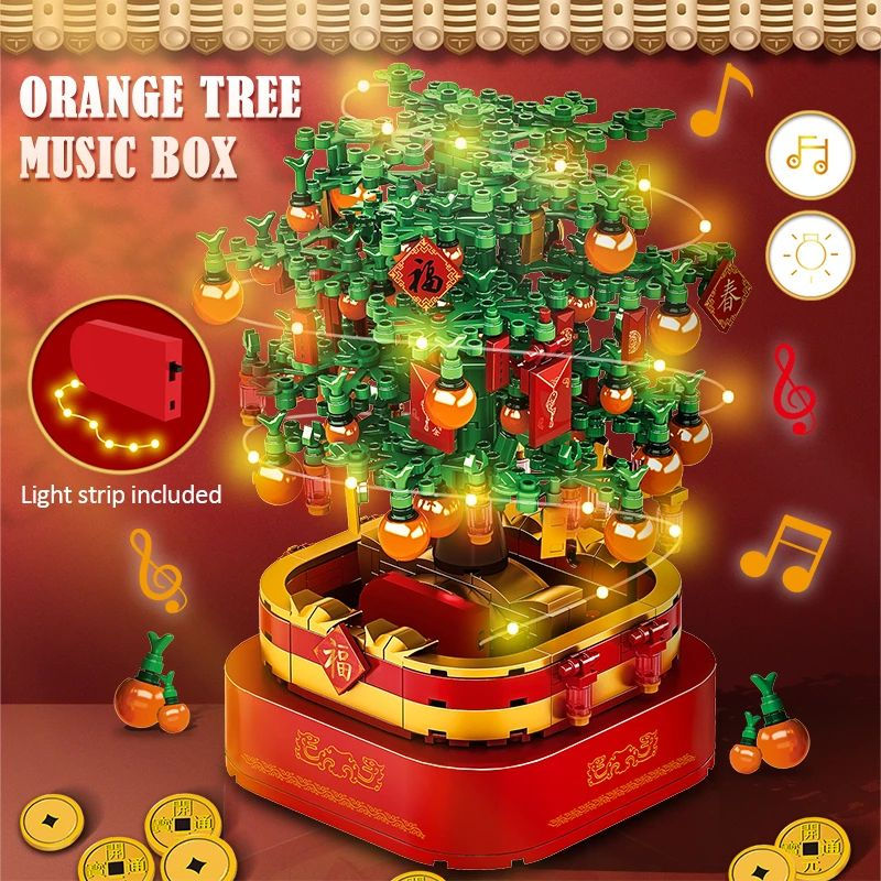 Thumbnail: 494-Piece City Rotating Light Music Box Toy with Kumquat Tree Design