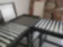 Roller conveyor in production at warehouse.