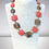 Thumbnail: murano glass necklace in coral and calcedonia colors