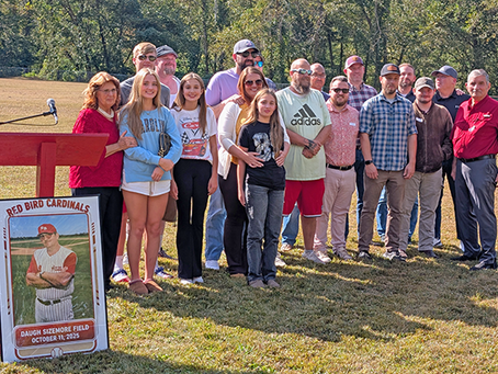 Daugh Sizemore Family & former players at field dedication