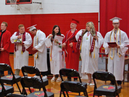 Class of 2026 waiting to greet well wishers