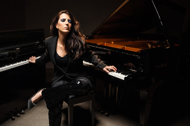 AYSEDENIZ CARNEGIE PRESS PHOTO WIDE.png