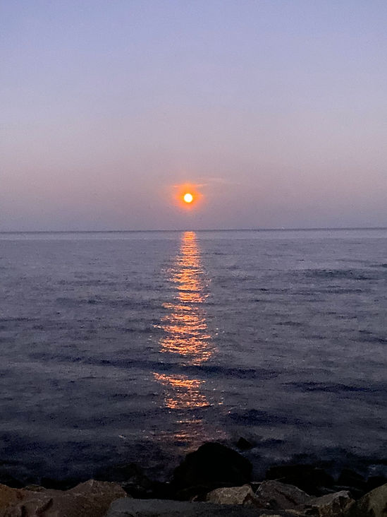 solnedgang-over-oestersoeen-ved-gudhjem.jpg