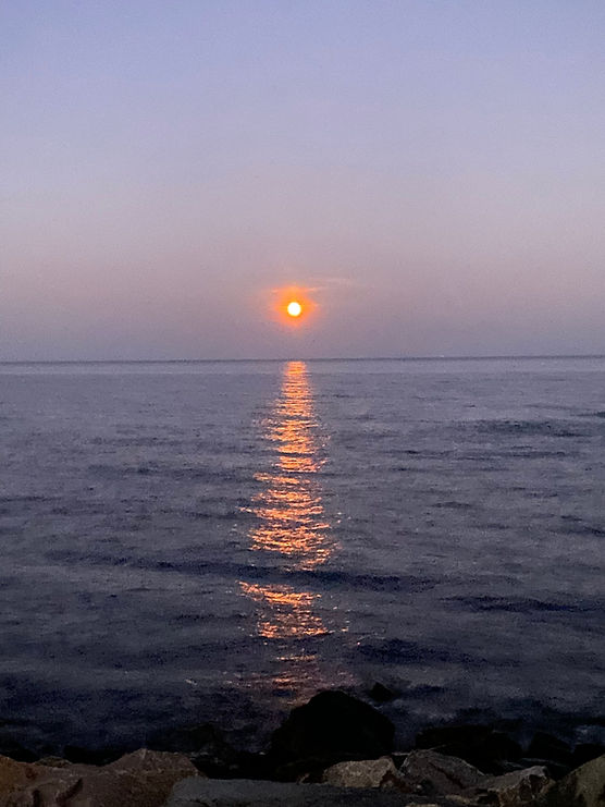 solnedgang-over-oestersoeen-ved-gudhjem.jpg