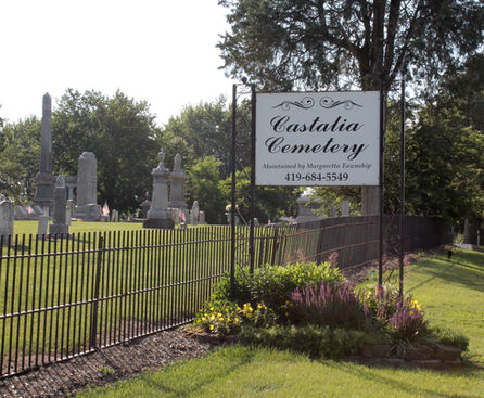 Castalia Cemetery Sign with Cemetery behind it