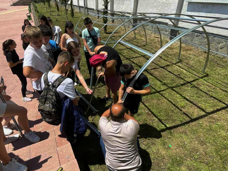 The participants building the green house