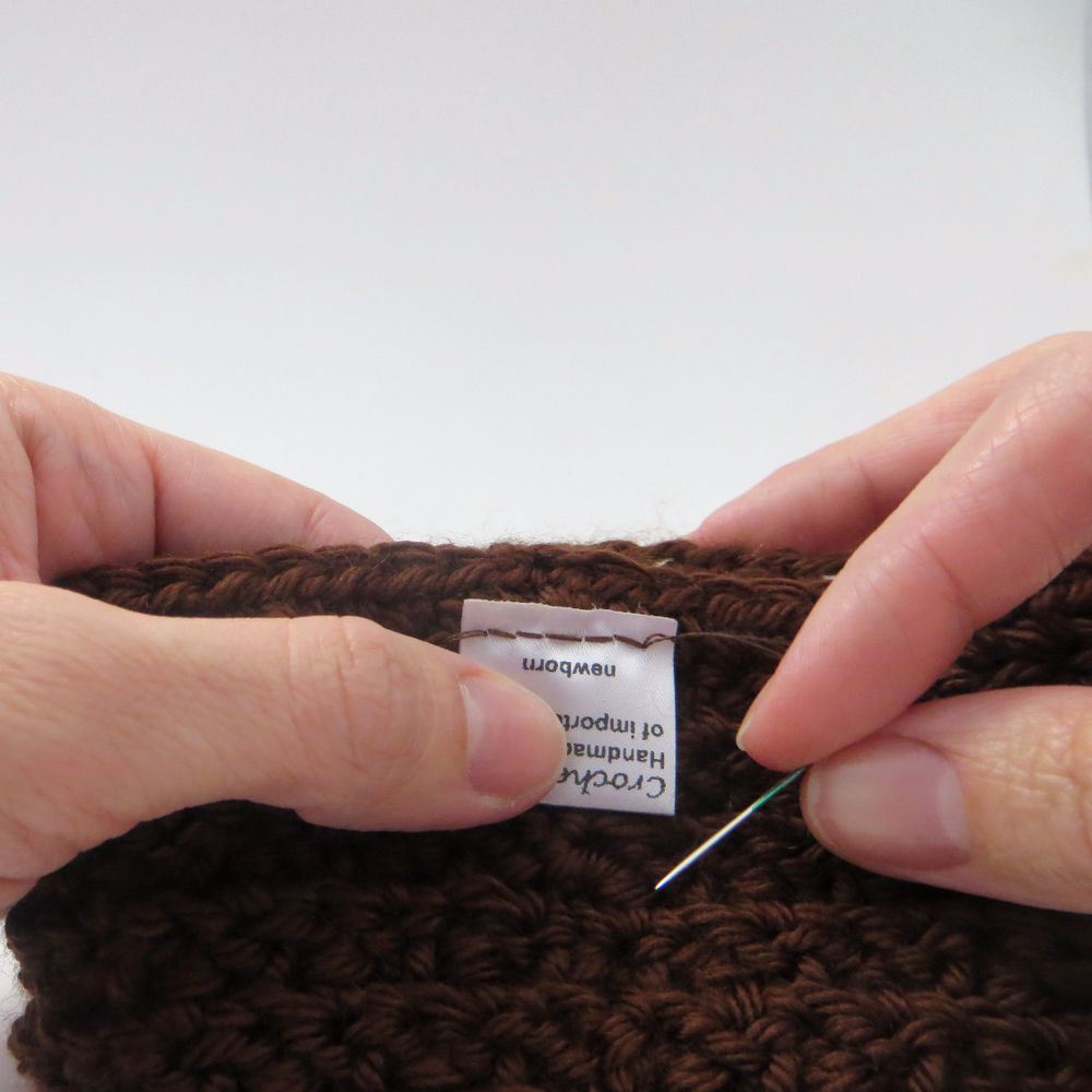 How to Hand Sew a Tag onto Crochet Garment