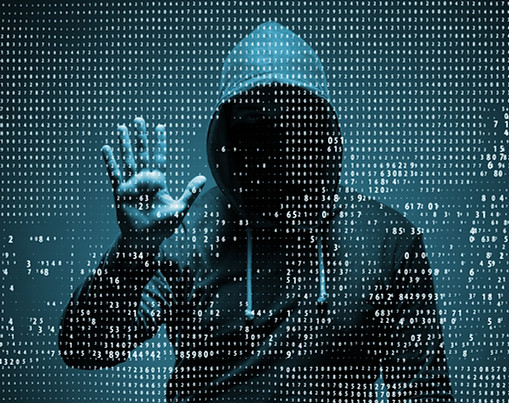 Young hacker in data security concept.jpg