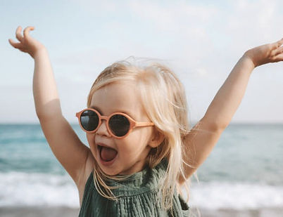 Child playing at the beach
