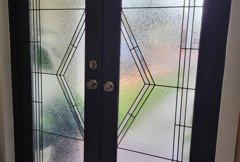 Stained glass door. Stained glass impact door. Stained glass door installation. Stained glass door in Miami Florida.