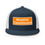 Thumbnail: Black and white trucker hat featuring an orange 'Bluetick Coonhound' patch on the front panel in bold white letters.