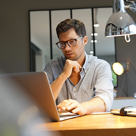 Young woman in leather jacket thinking while holding a book