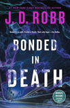 Purple smoke twists around the title letters. A city and the highway reading it are barely visible.