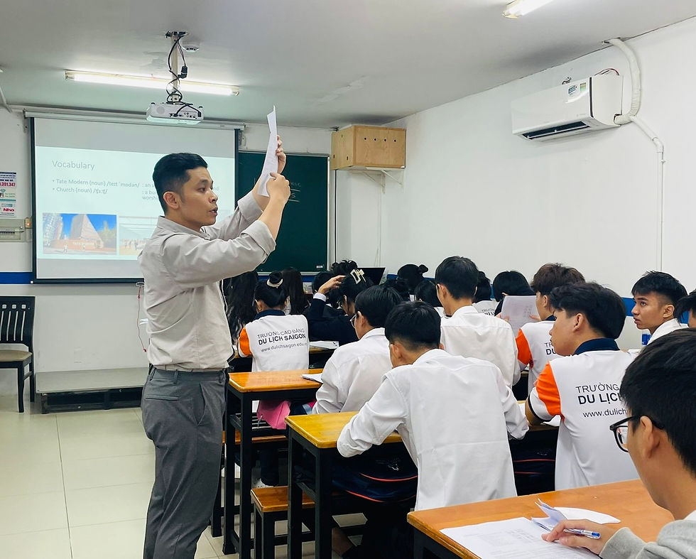 TEFL International Vietnam trainees during observed teaching practice with Vietnamese students.