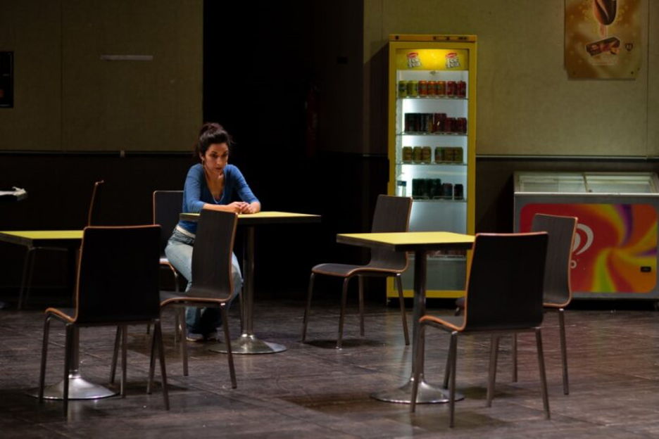 Fanny (Elise Douyere), thoughtful and troubled, at César’s café where her beloved Marius works. Photo: Agathe Pommerat. Courtesy of Almada Festival