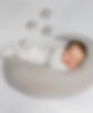 Sleeping newborn portrait laying on a moon at La Bella Sole Photographyth stars