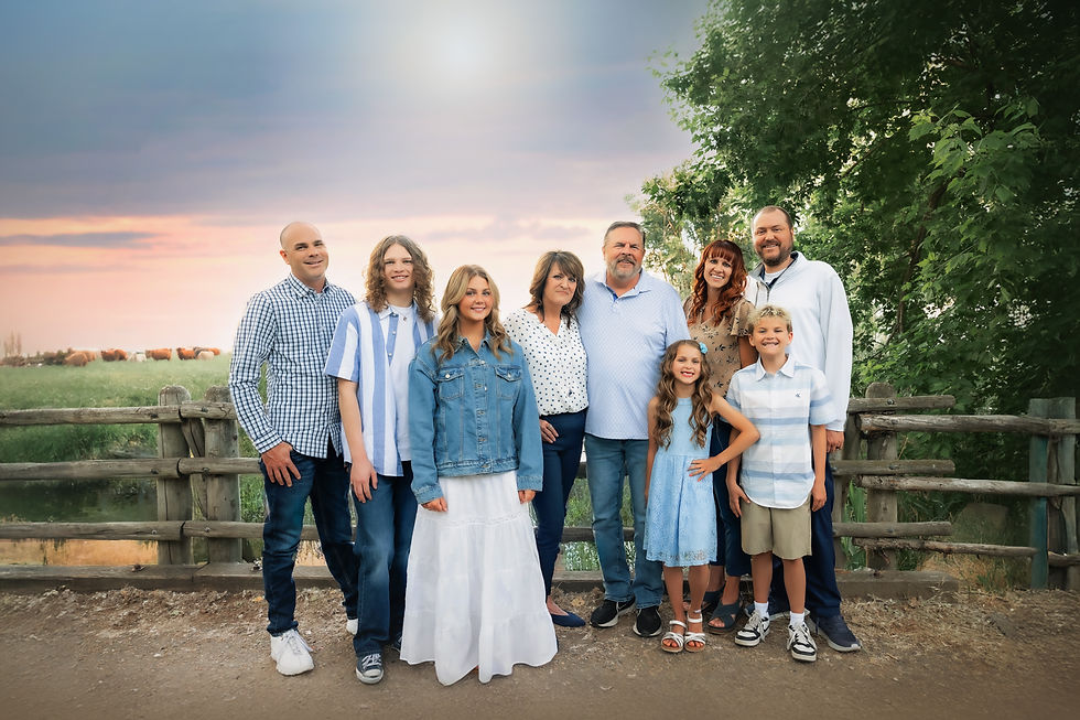 Family standing together outdoors during a family location photography experience in Utah