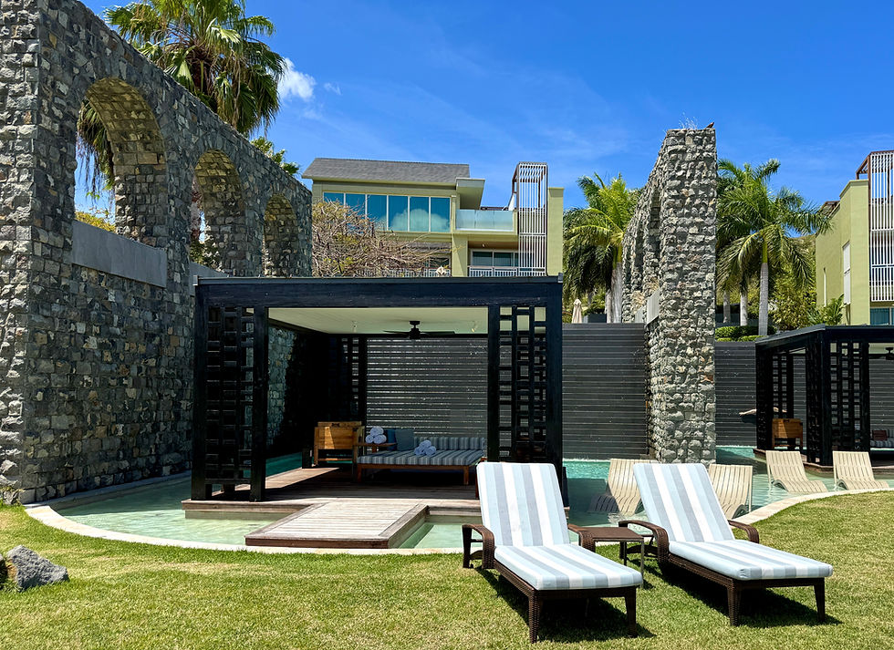 Private cabanas at Park Hyatt St. Kitts with shaded seating and beach access