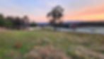 sunset over the dam and mountains