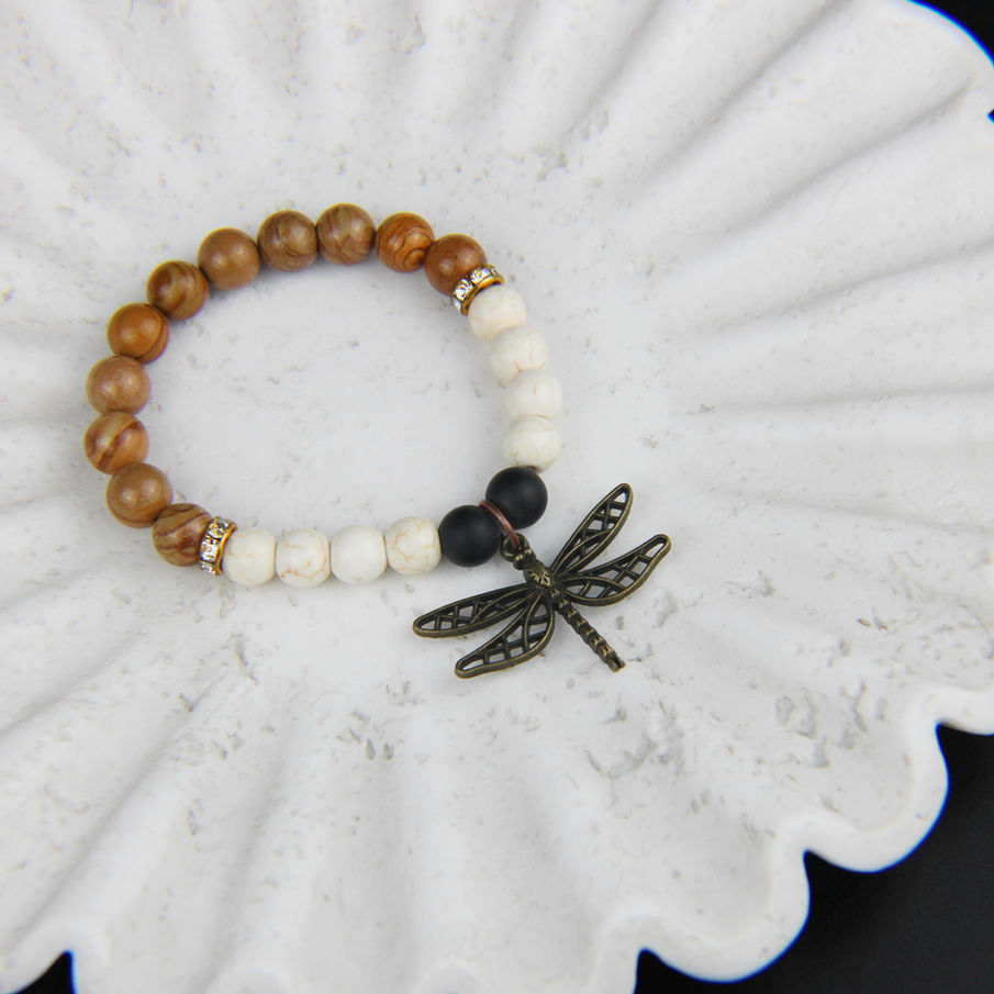 Bracelet en pierre d'agate noire et magnésite, orné d'une libellule