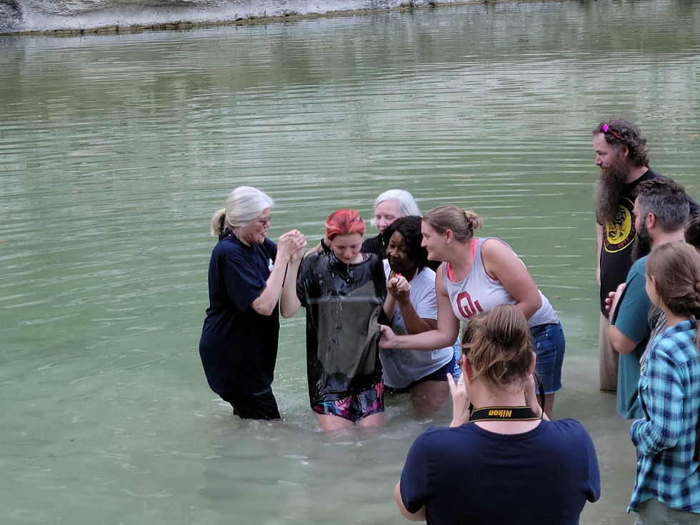 Being baptized at a previous retreat.