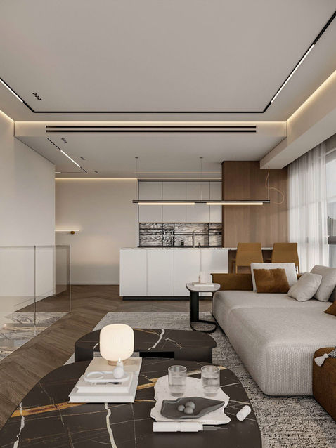 Cozy open-plan space connecting kitchen and lounge, styled with neutral and terracotta tones, tactile fabrics and dark marble coffee tables. sence architects