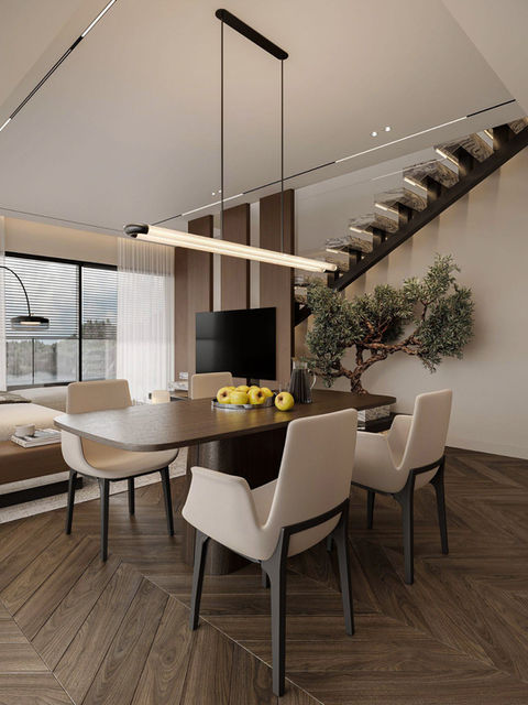 Elegant dining space framed by warm wood and floor-to-ceiling windows, with sculptural staircase and indoor olive tree adding architectural depth.