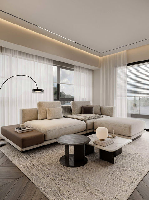 Contemporary living room with light upholstered sectional sofa, textured area rug, and sculptural coffee tables in marble and dark wood. Sence Architects