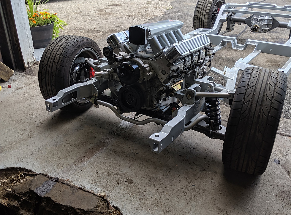 Custom vehicle chassis with suspension system and air bag setup for performance upgrades