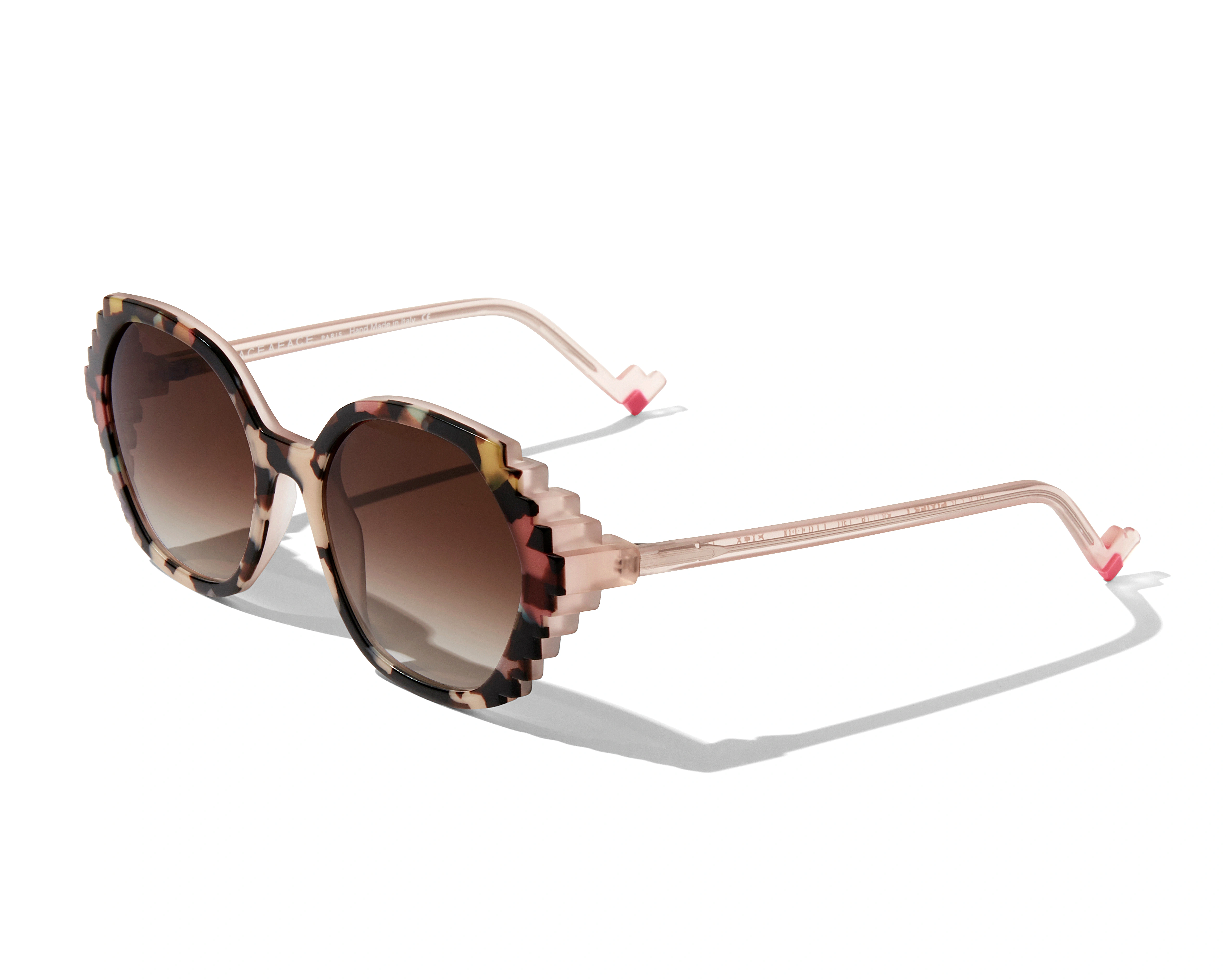 Pair of designer sunglasses with geometric shape