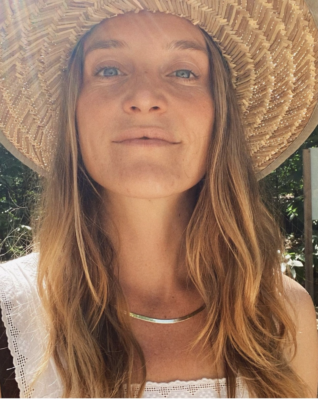 Woman in wide brim hat