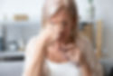Woman rubbing eyes