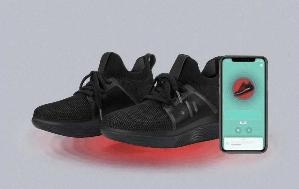 Product photo of high tech shoes and mobile app