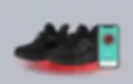 Product photo of high-tech shoes and mobile phone app