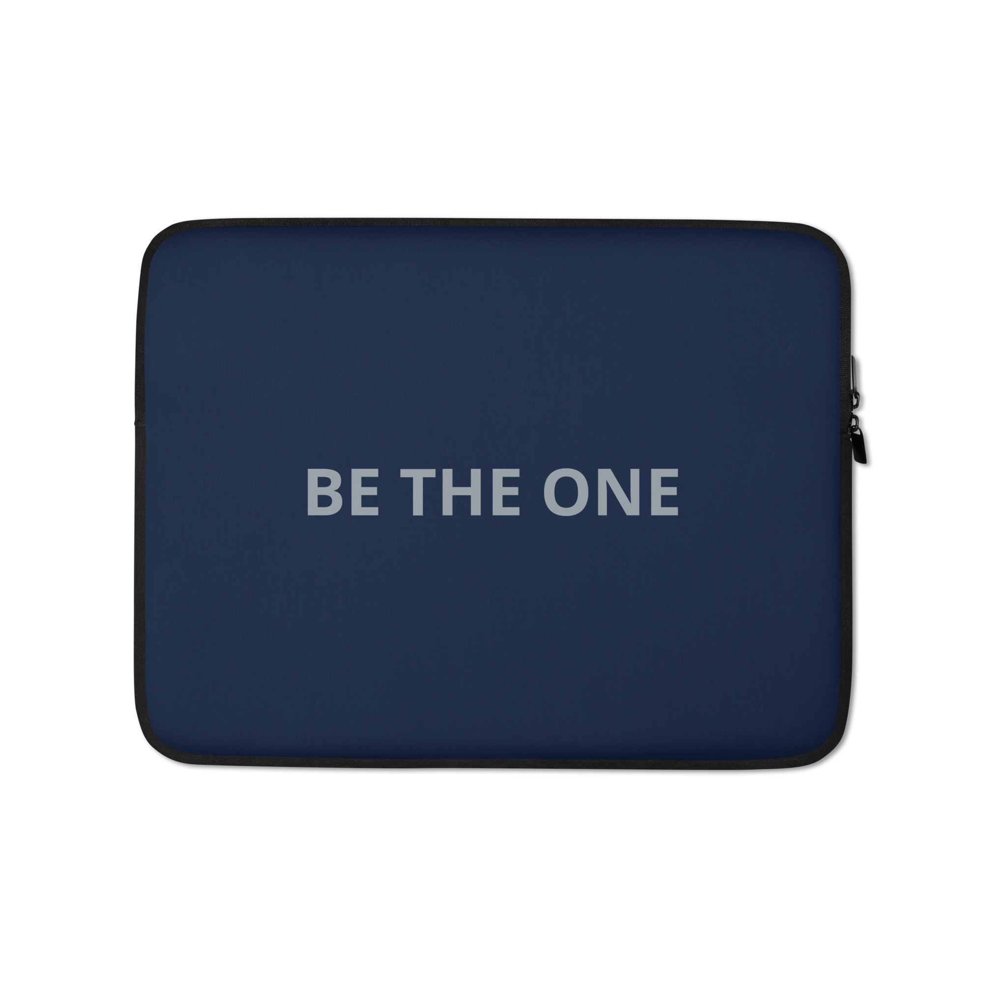Navy laptop sleeve featuring the statement BE THE ONE.